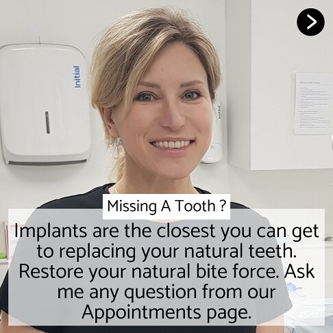 Whites dental specialist for Dental Implants in London sitting in clinic