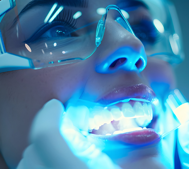 women during in-clinic whitening with led light for activation